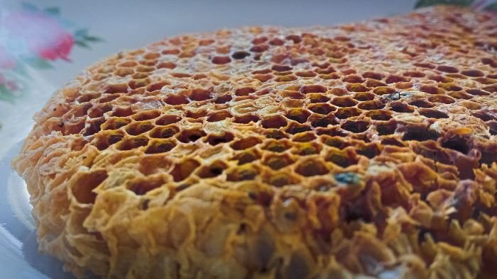 mold on capped honeycomb in beehive frame