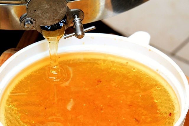 Honey dripping out of the Best Honey Extractor